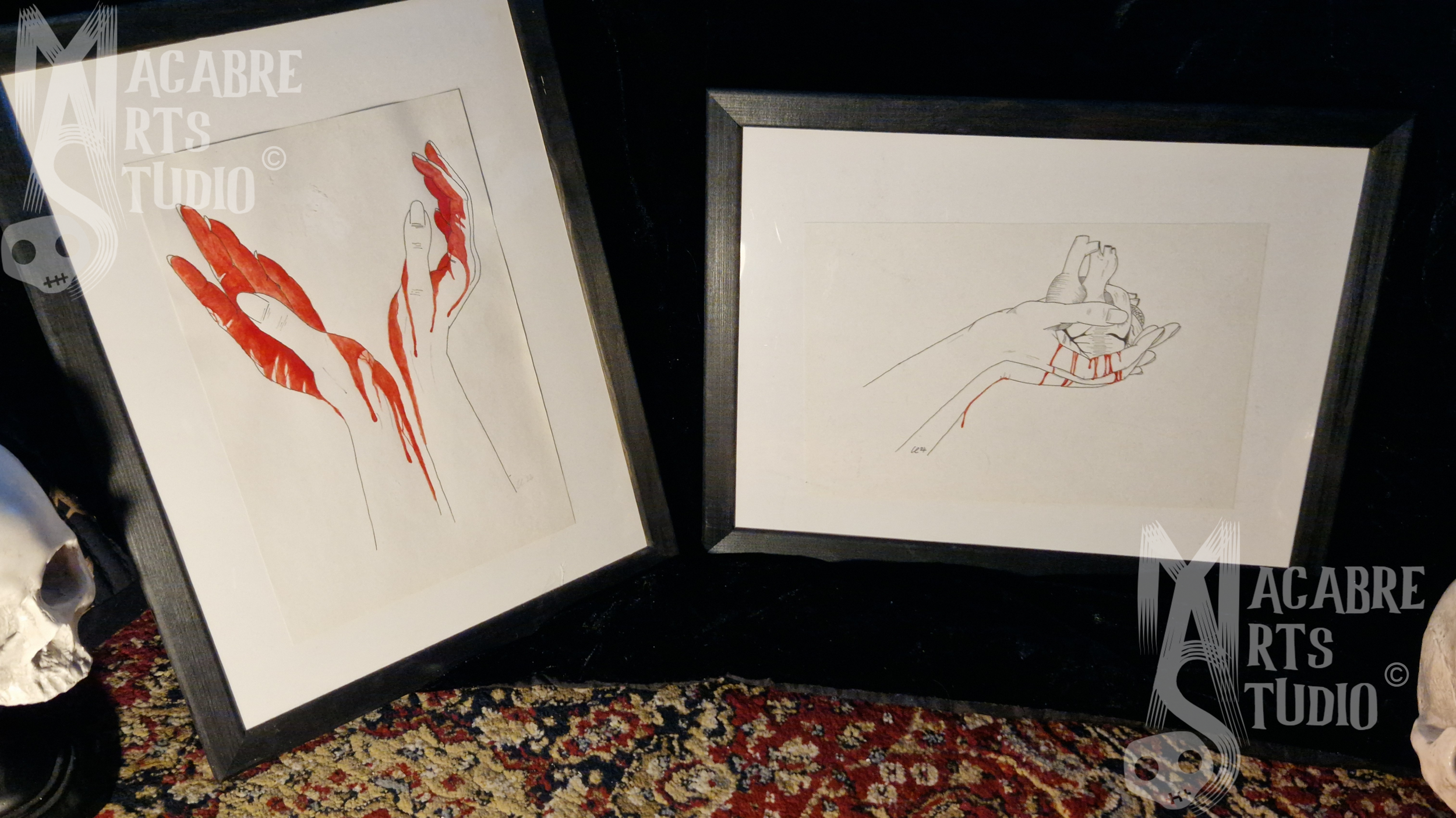 Artworks depicting hands in a minimalist line style; left shows a hand with red running down them, and right shows a similar hand with an empty heart in them with red dripping down. Overlaid with copyright watermark.