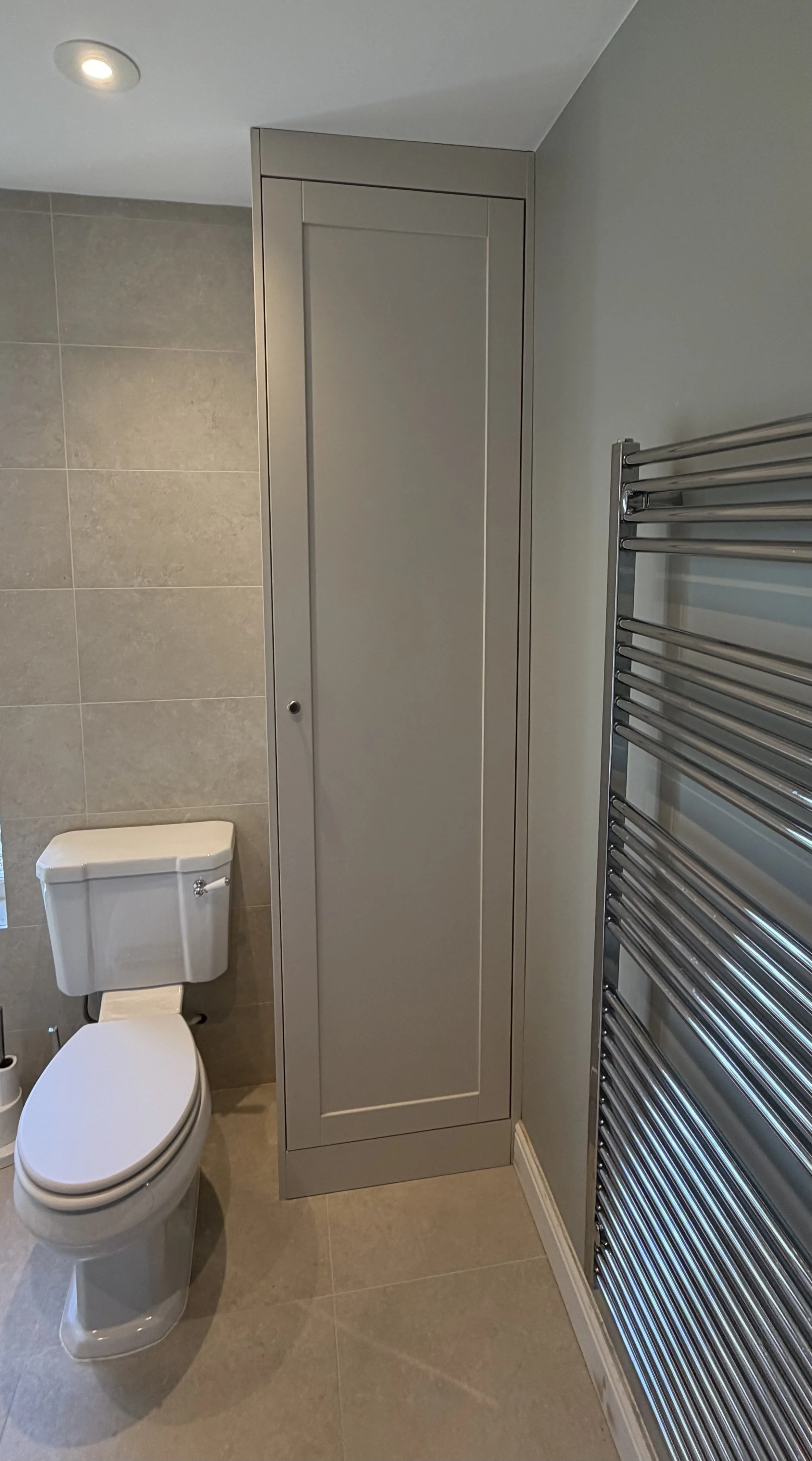 Bespoke Wooden Bathroom Boiler Cupboard, Hand Paint Spray Finishing in 'Farrow & Ball Skimming Stone' by Broadstone Interiors. 

Partnership project with S3 Carpentry.