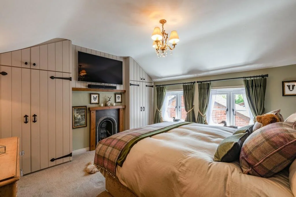 Bespoke - Fitted Wooden Handcrafted and Painted, Scribed Fitted Wardrobes with Media Wall & Interior Design by Broadstone Interiors.