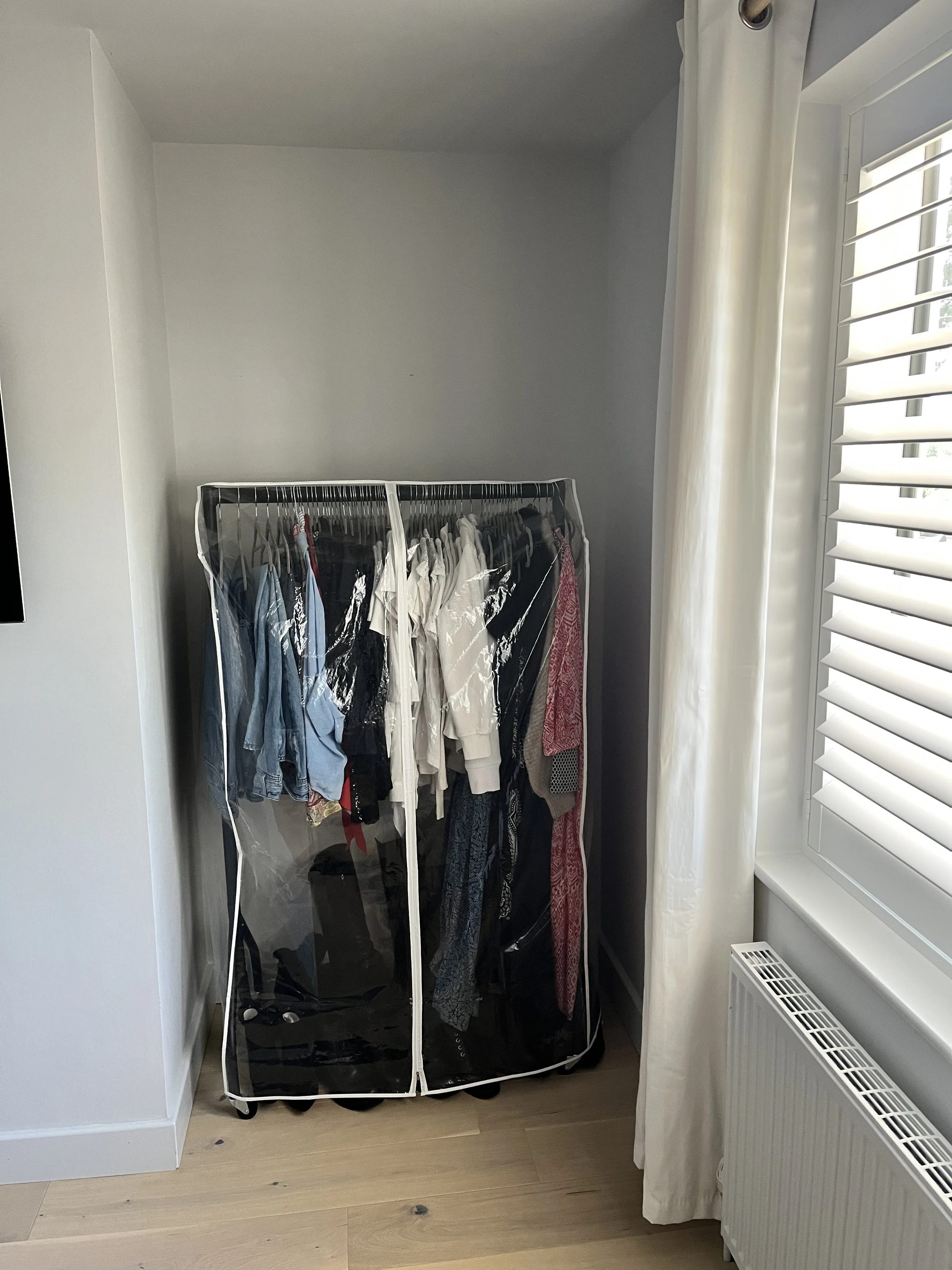 Before - Temporary Hanging Wardrobe Rail.