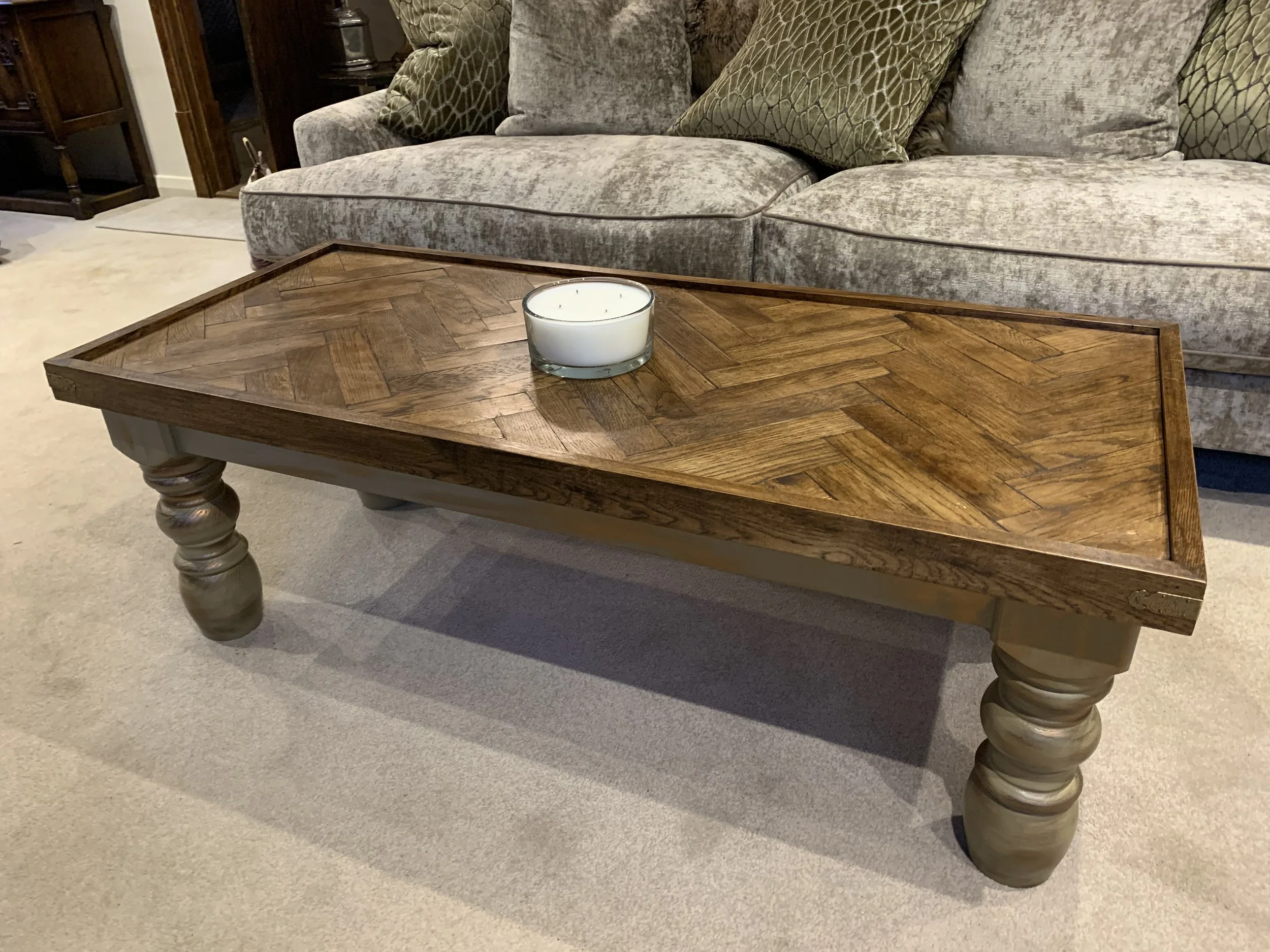 Bespoke Designed and Handcrafted Wooden Coffee Table with Gold Wax Rub Detailing, on Ornate Wooden Legs and a Parquet Herringbone Top.