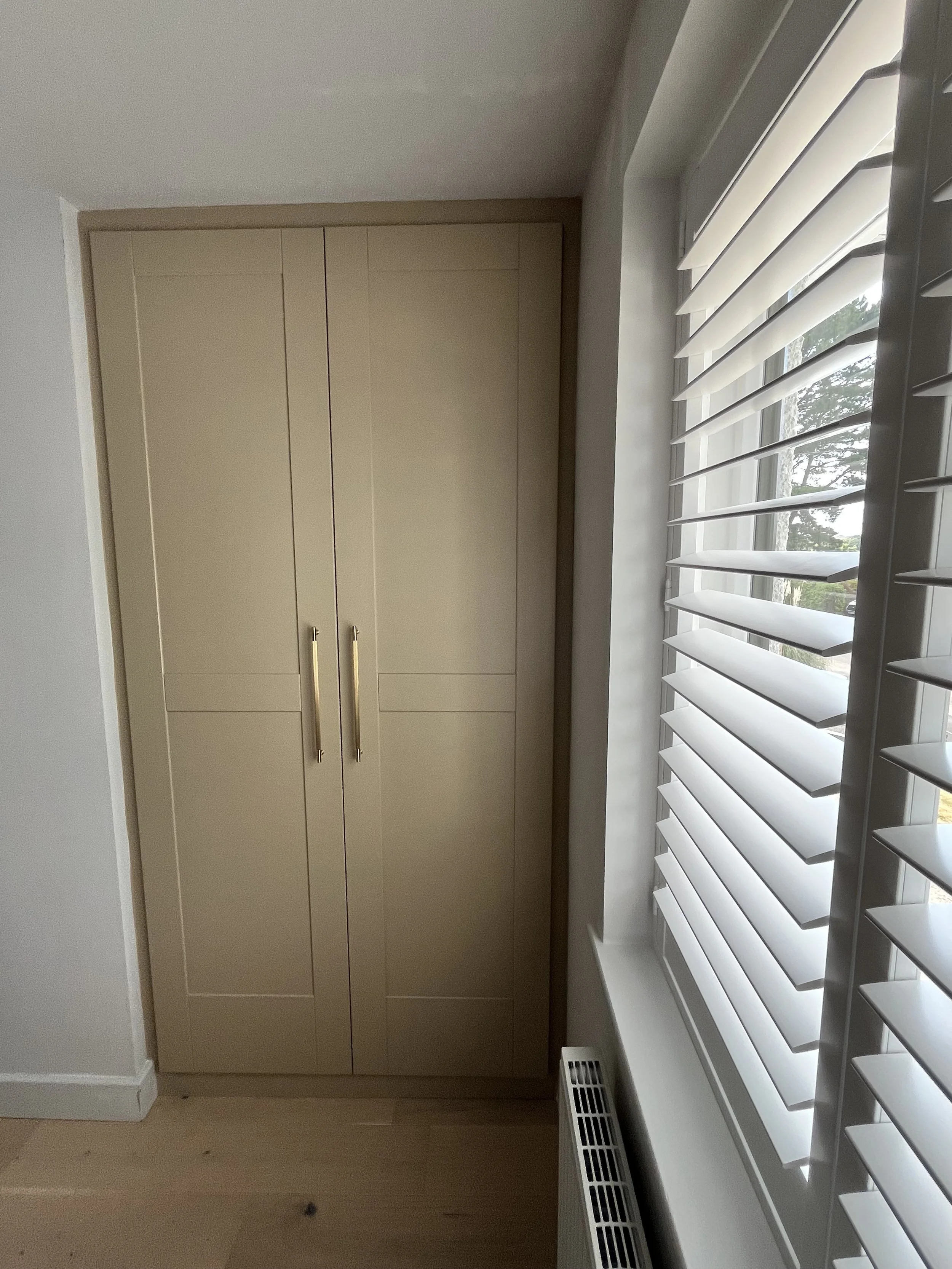 After - Bespoke Handcrafted and Spray Painted Fitted Wardrobes with Shaker  Doors and Gold Handles.