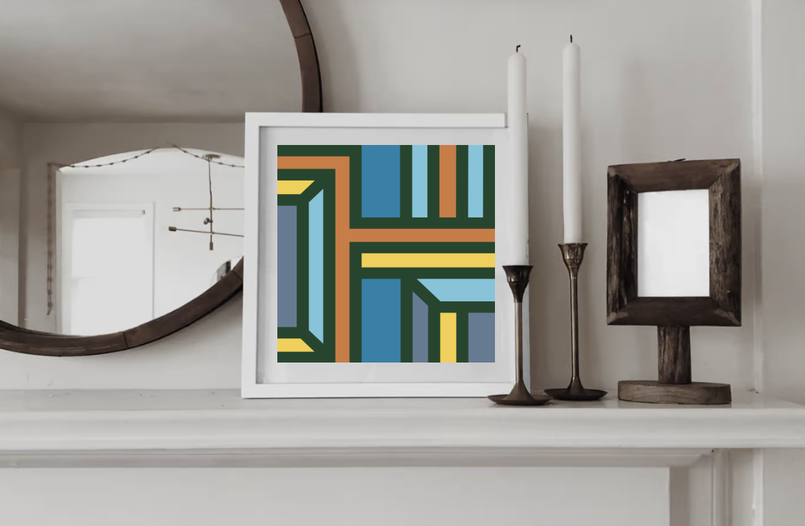 Contemporary geometric art print in yellow, light blue, orange and blue  tones displayed in a white wood frame on a shelf in a contemporary interior.