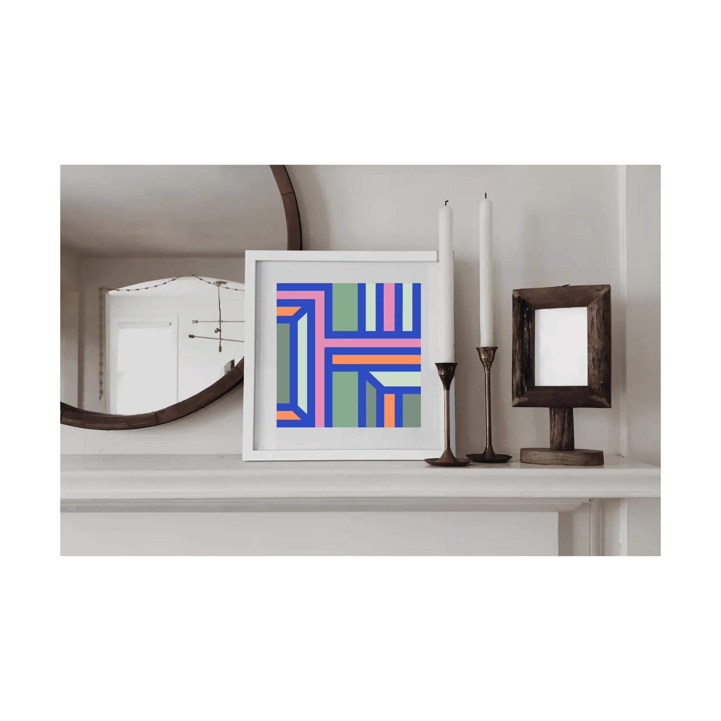 Contemporary geometric art print displayed in a white frame on a mantelpiece in a stylish neutral living room.