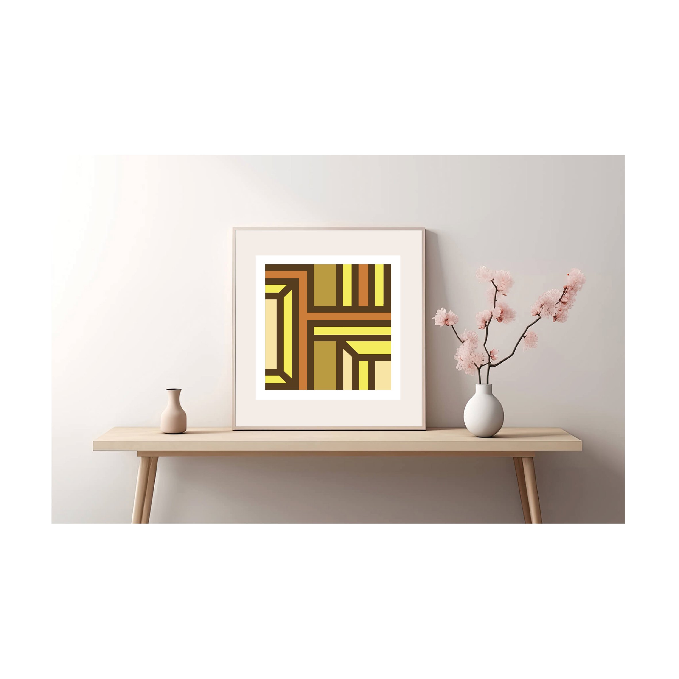 Framed geometric abstract giclée print in warm brown, ochre, burnt orange and yellow displayed on a minimalist wooden console table in a contemporary interior.