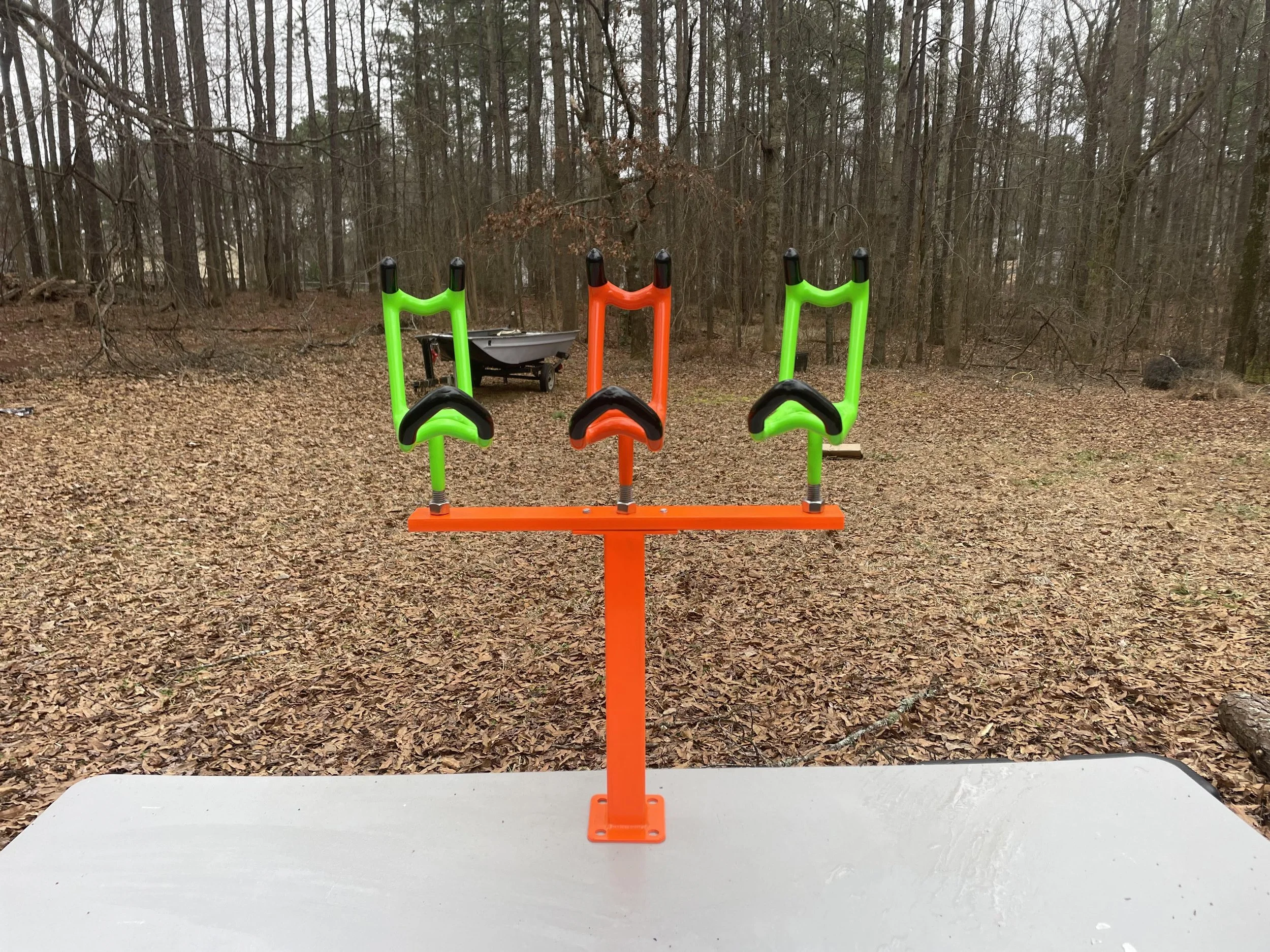 • Custom TIG welded fishing rod rack for catfishing boat setup
• Powder coated V-Bar fishing rod rack holding up to 5 rods
• Heavy-duty T-Bar rod rack with threaded aluminum top
• Made in USA fishing rod holder rack for boats
• Custom spider rigging
