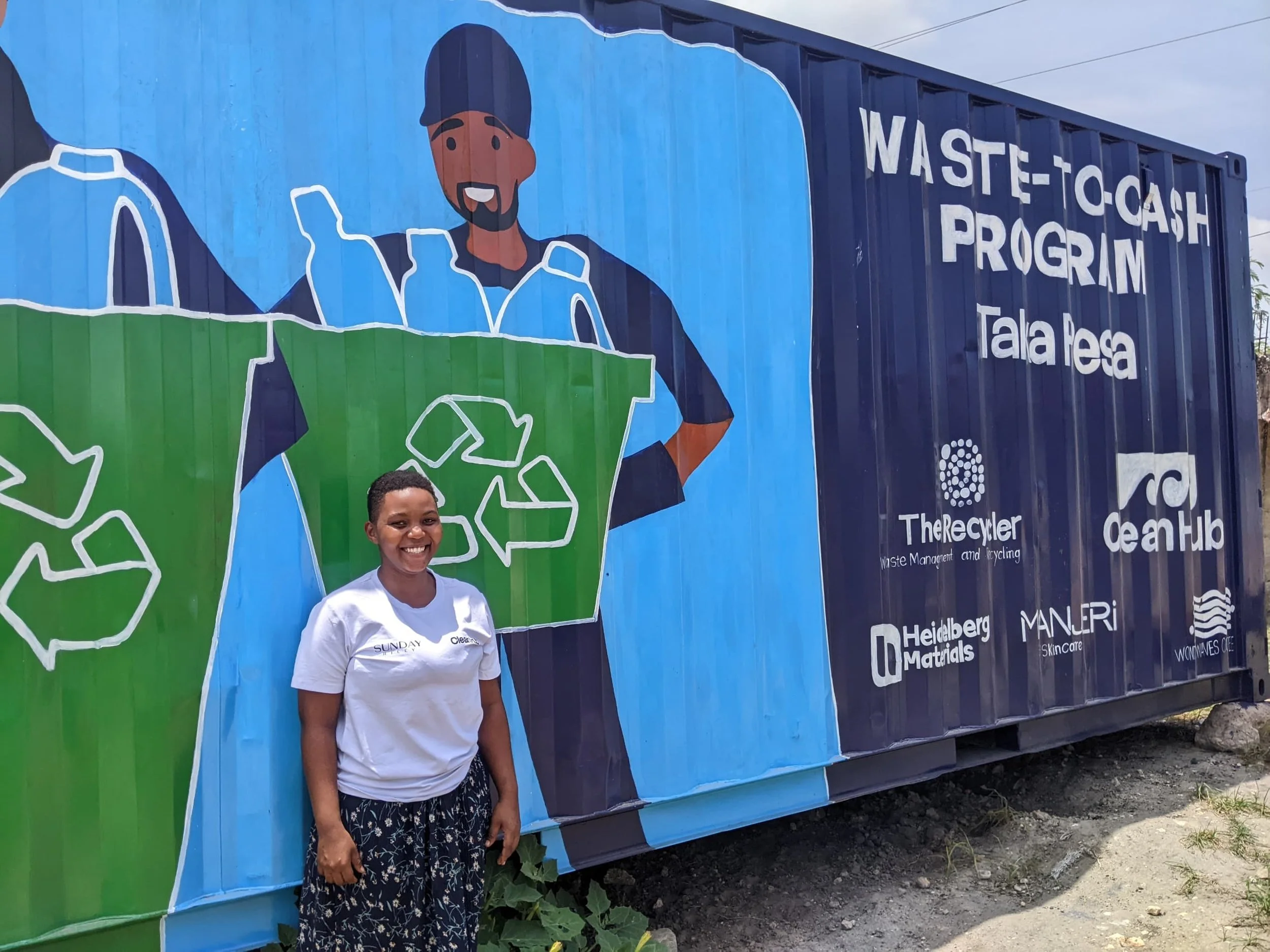 Taka Pesa Waste-to-Cash container with mural in Dar es Salaam
