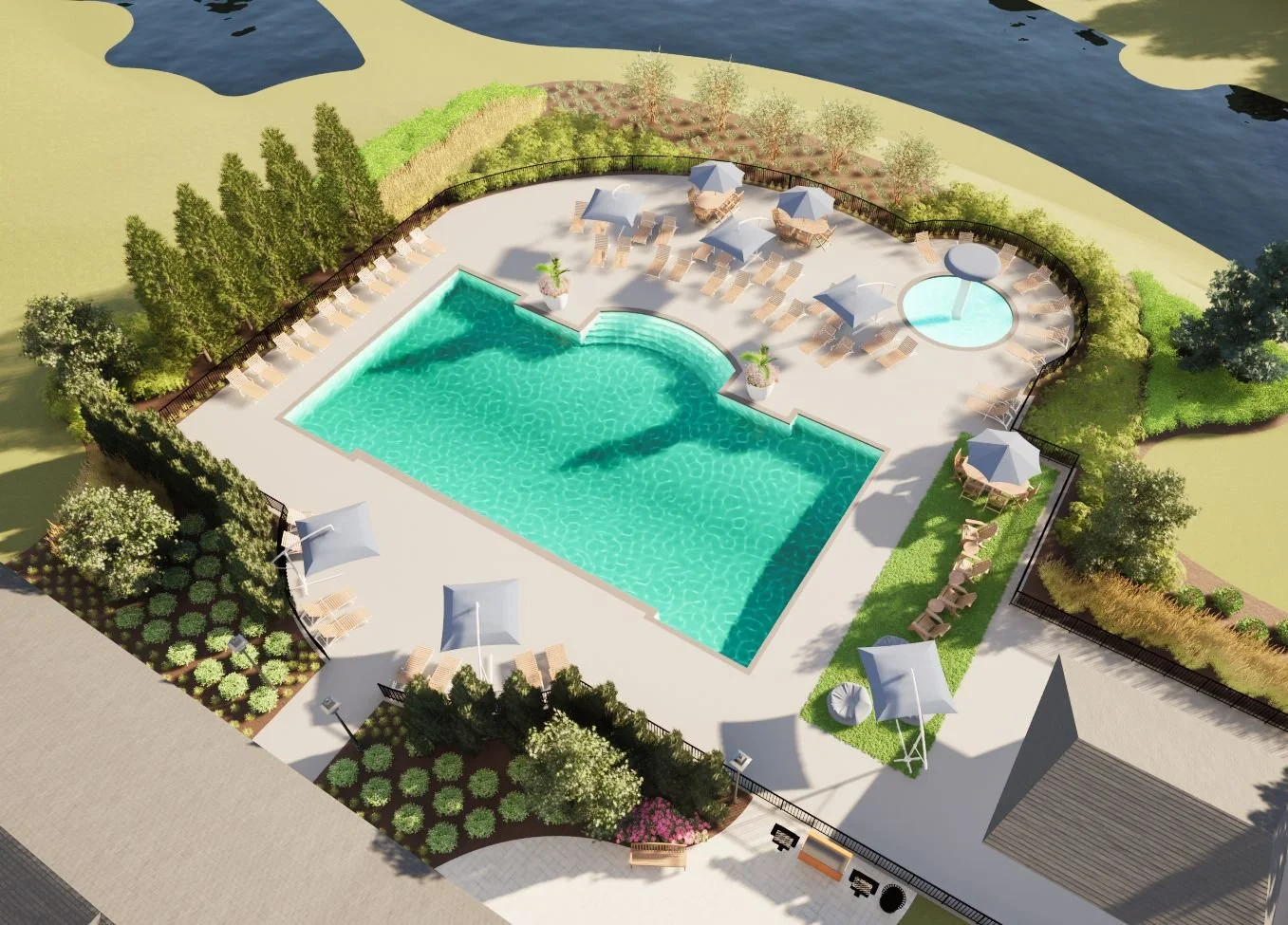 An aerial view of a swimming pool area with lounge chairs, umbrellas, a small hot tub, and landscaped greenery, situated near a body of water.