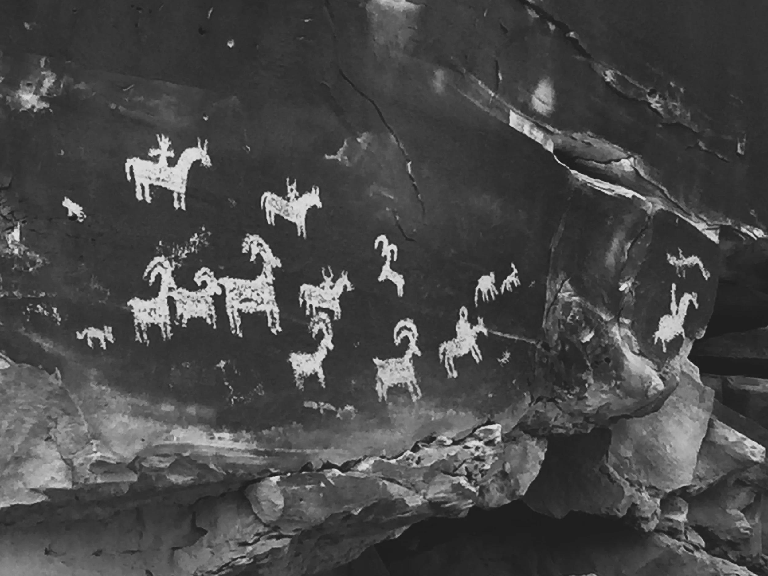 Thou the petroglyph and stone;