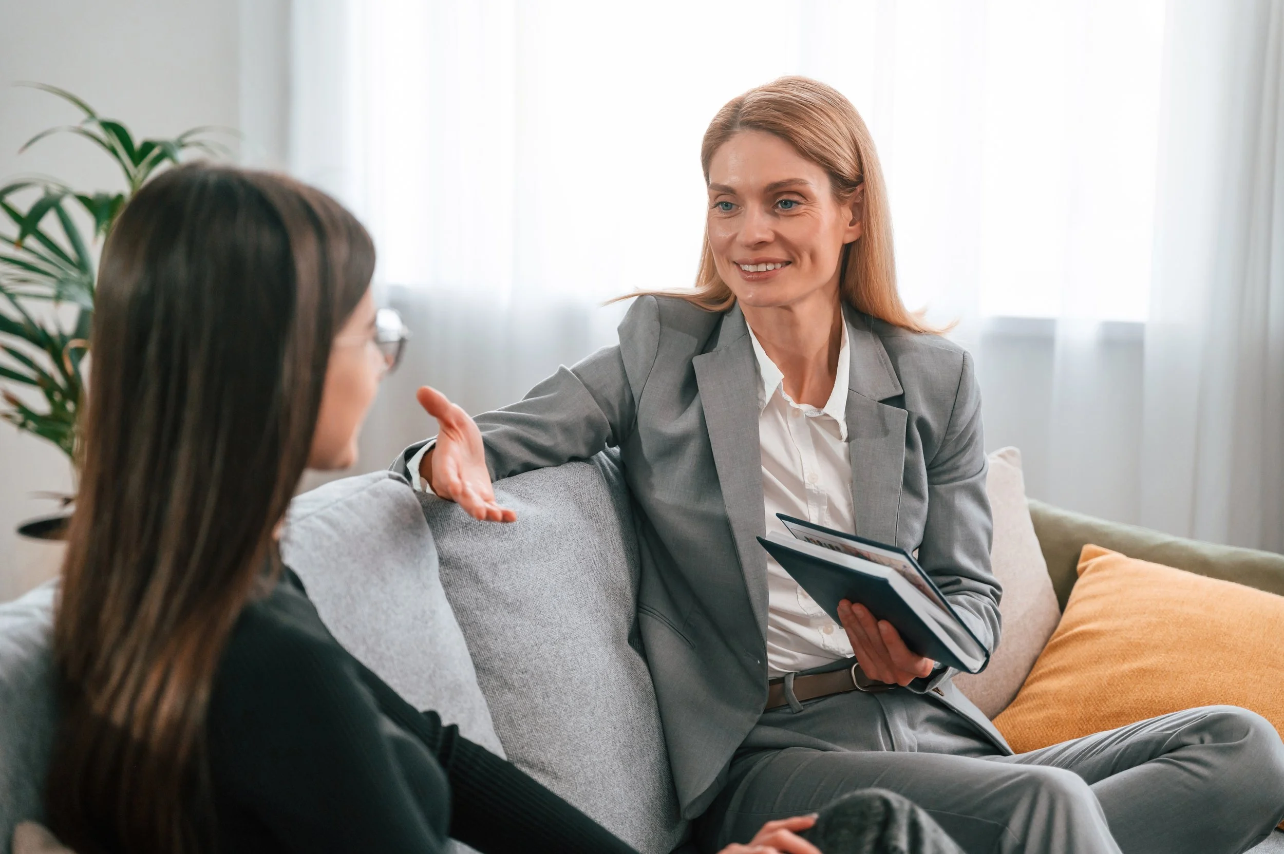 Businesswoman talking to a therapist