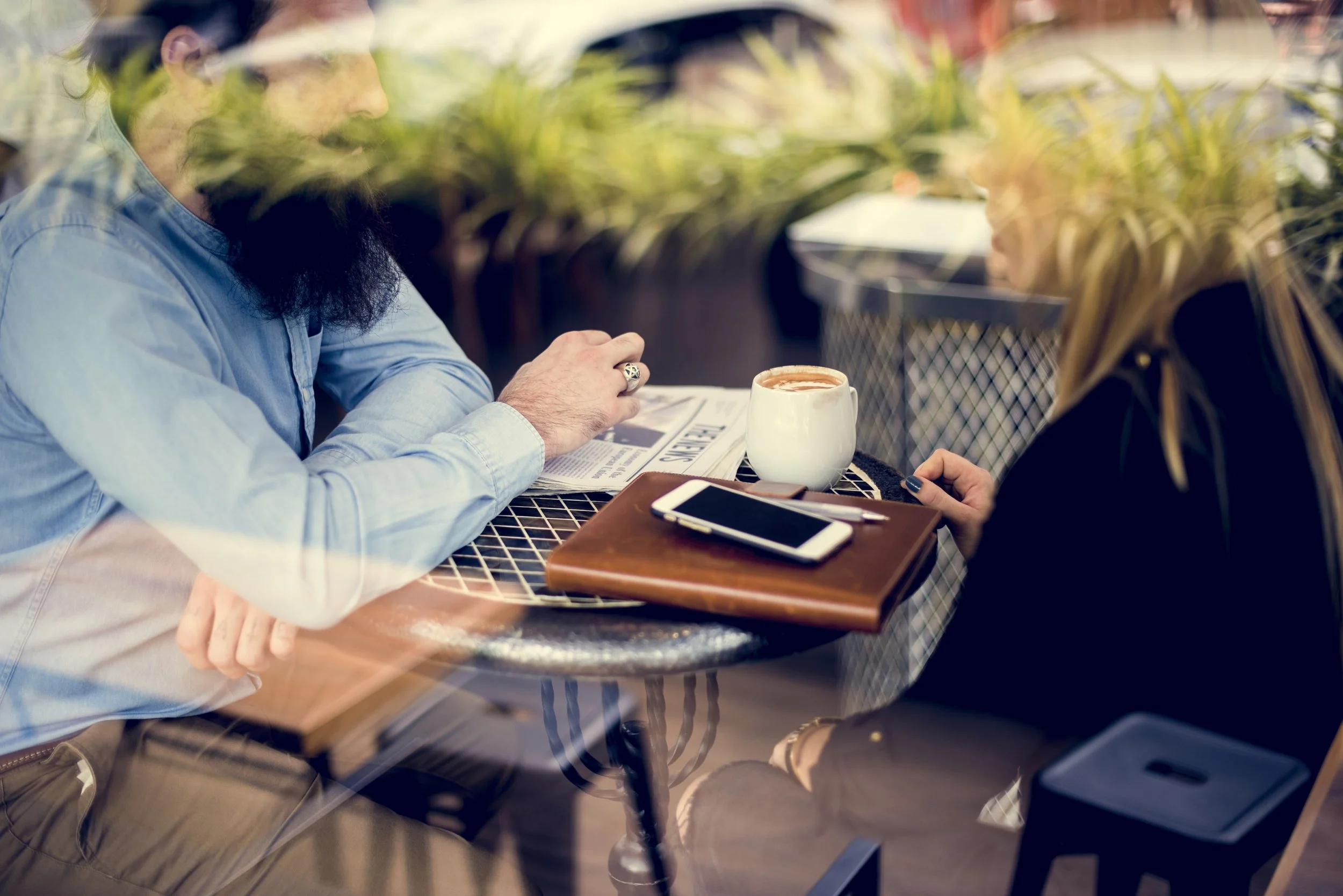 Man and woman meeting in a cafe
