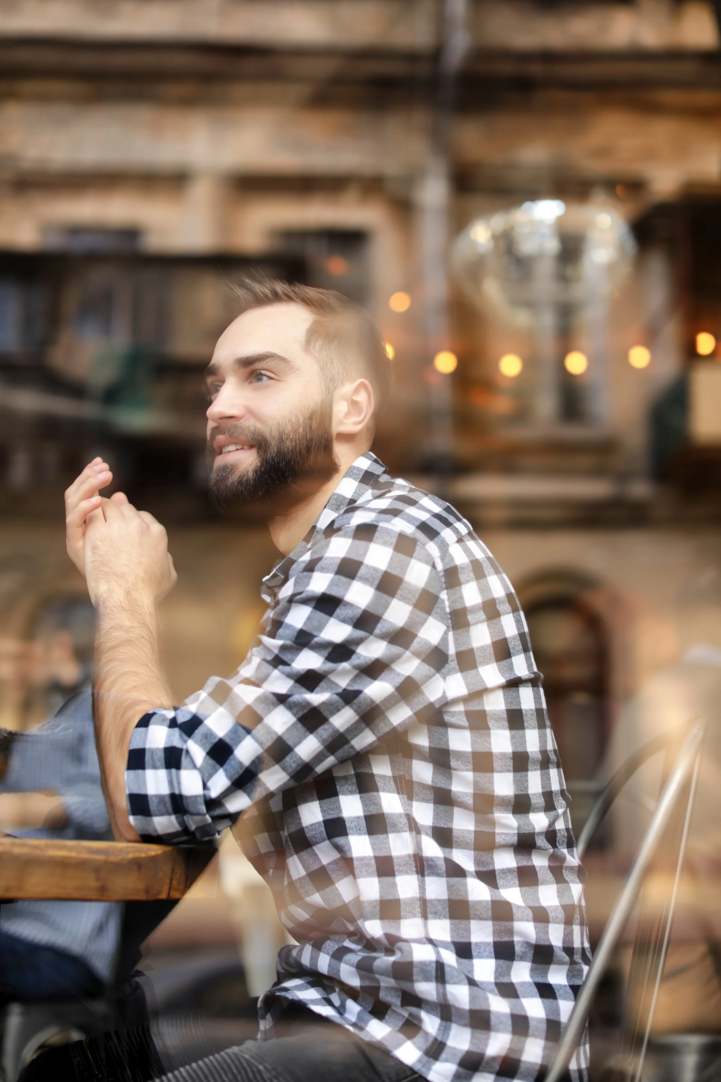 Young man waiting in a cafe