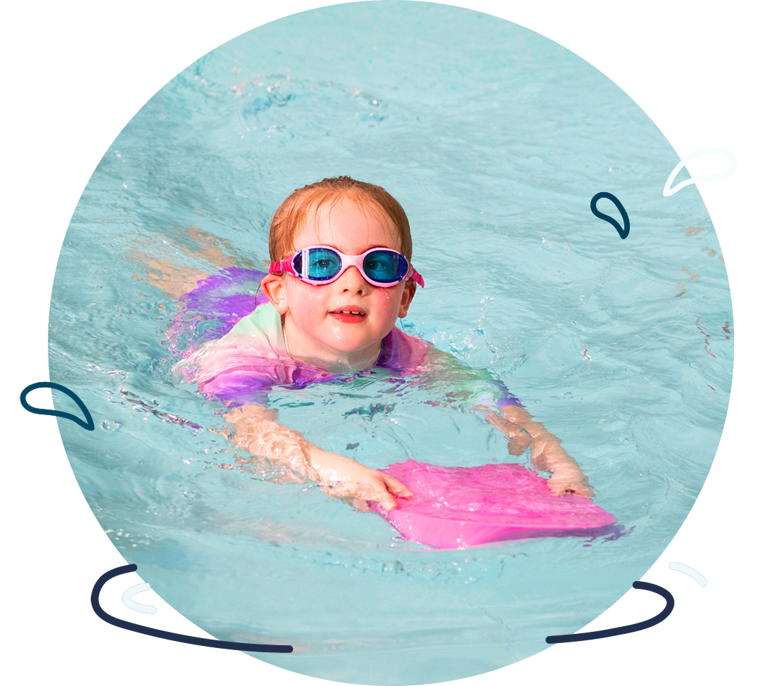 Baby swimming with aid