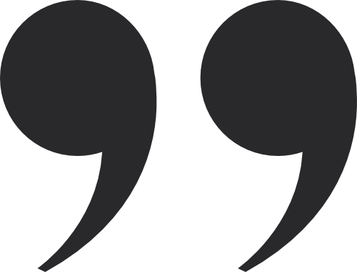 Large black quotation marks on a white background