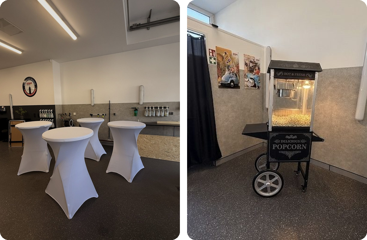 Tische mit weißen Hussen, eine Getränke-Station mit Gläsern und Flaschen, und ein Popcorn-Wagen in einem Veranstaltungsraum.