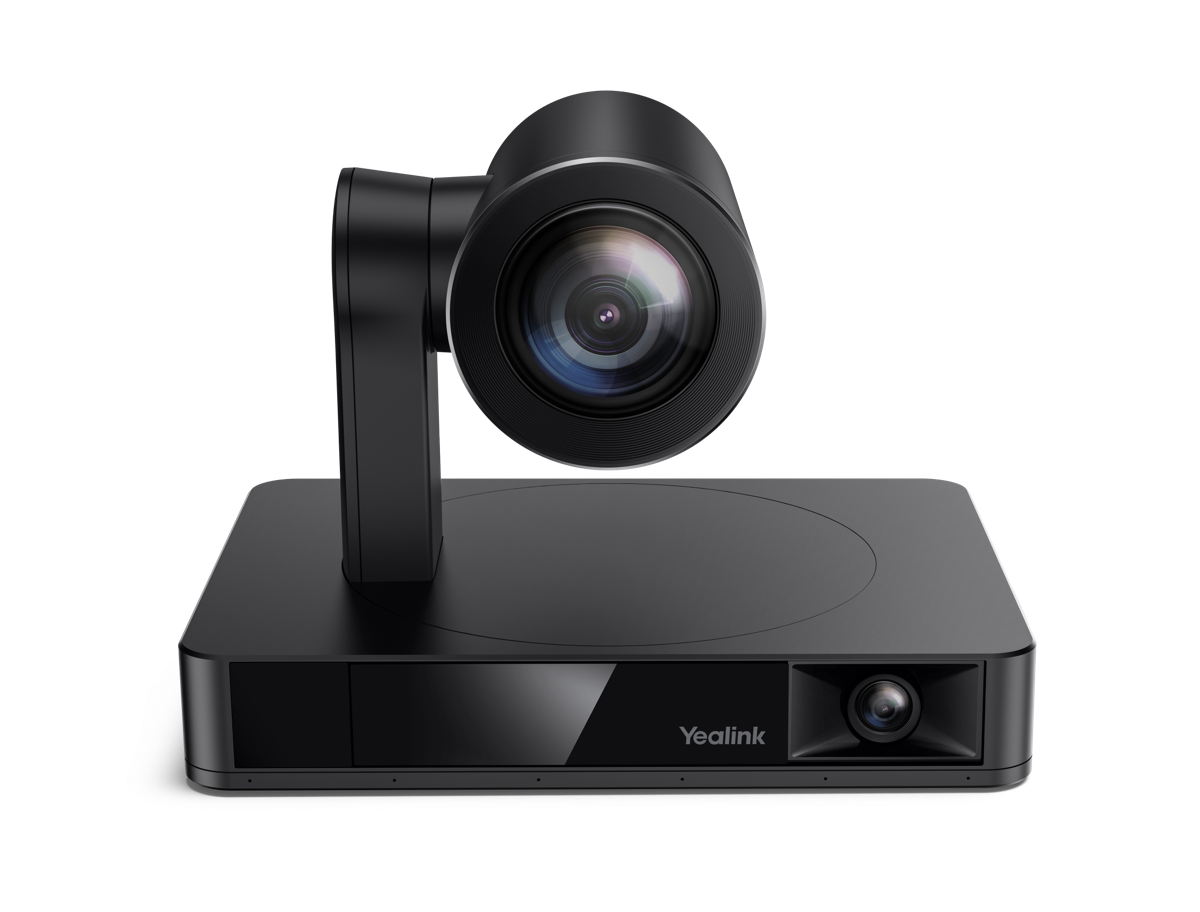 A black Yealink conference camera with a large lens and adjustable stand placed on a flat surface.