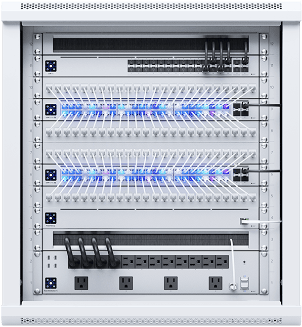 A network server rack with multiple fiber optic cables and patch panels, equipped with power outlets and cooling vents.