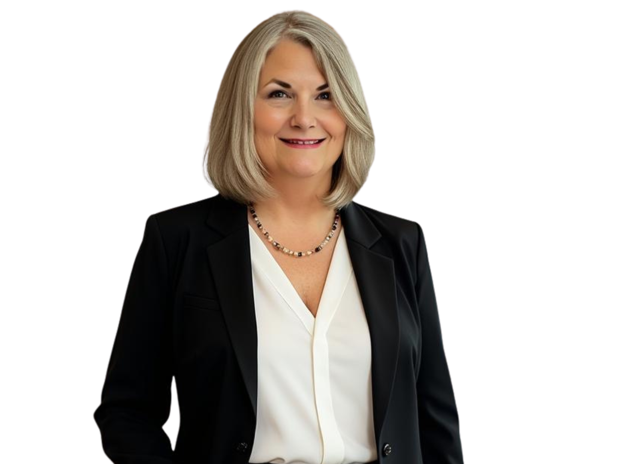 A woman with blonde hair wearing a black blazer, white blouse, and a necklace, smiling