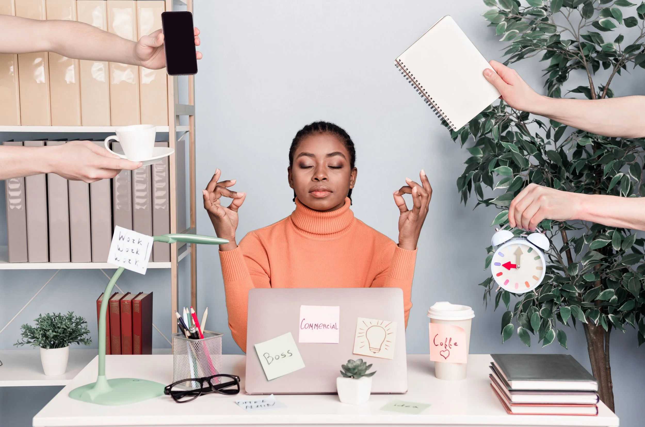 woman managing many workplace stressors