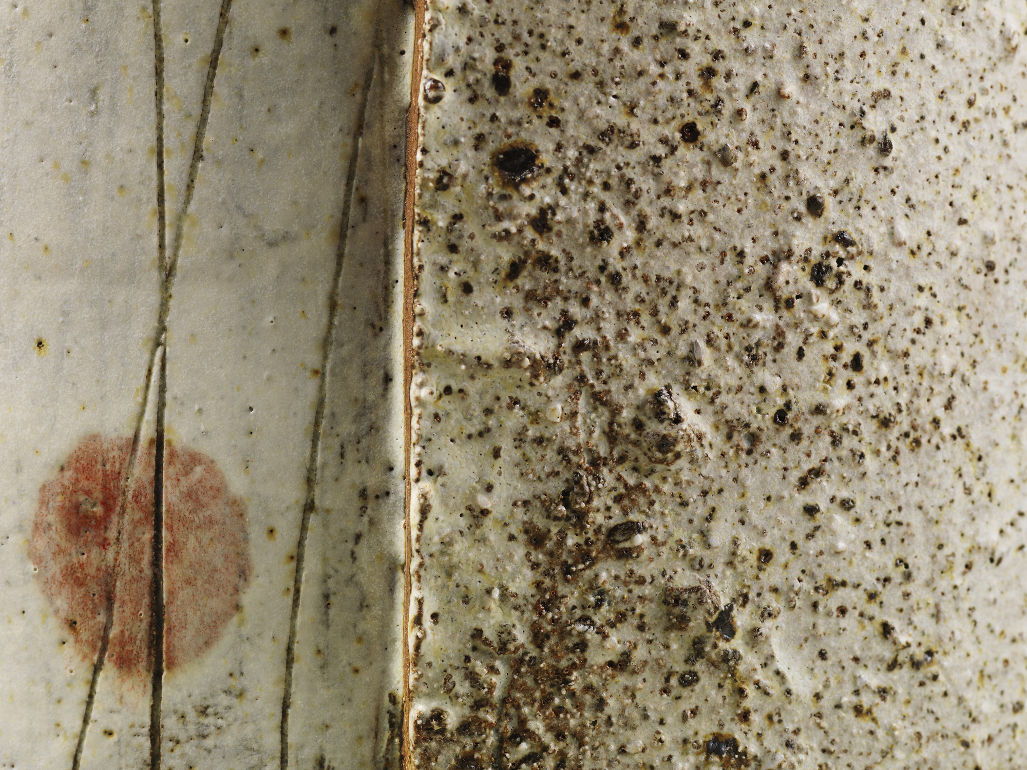 Close-up of dirty ceramic tiles with grout lines, stained and stained with dark spots and discolored areas.