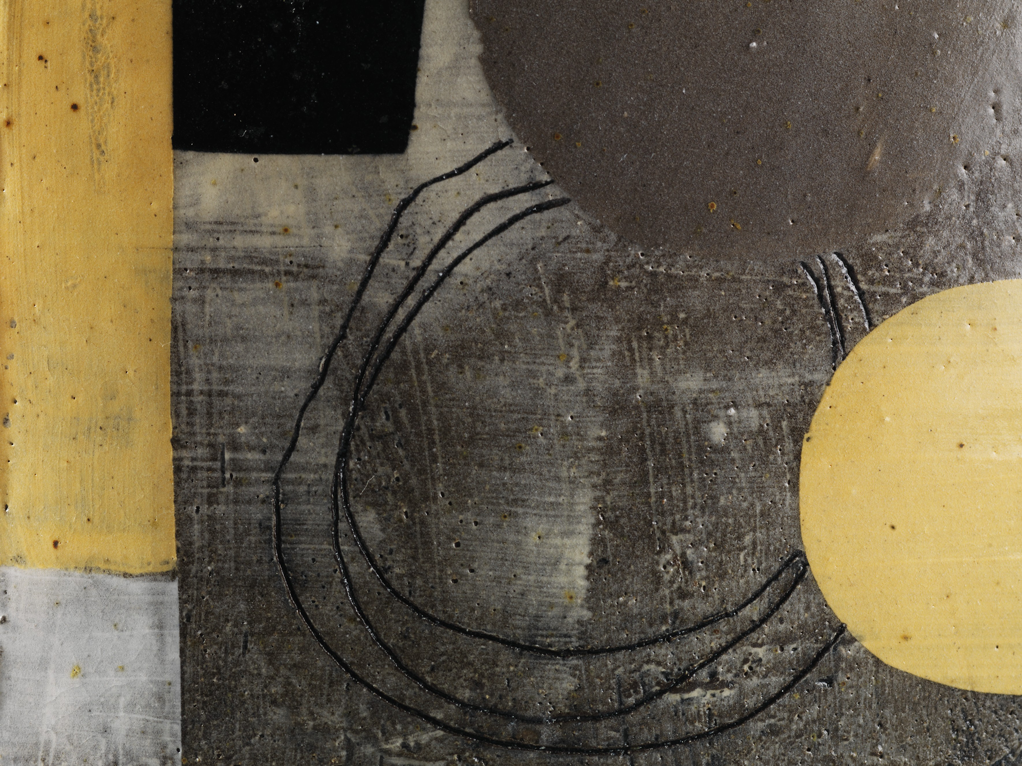 A close-up of abstract geometric artwork featuring a large yellow semicircle, a black square, and black curved lines on textured gray and white background.