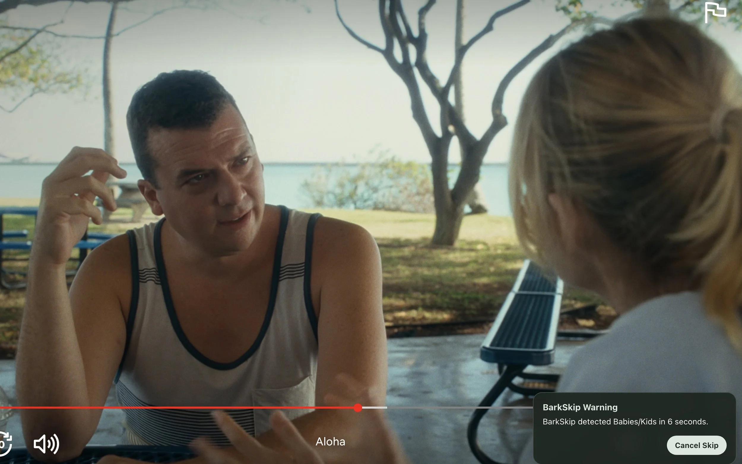 Screen grab of BarkSkip warning about Babies/Kids while watching the movie Aloha on Netflix