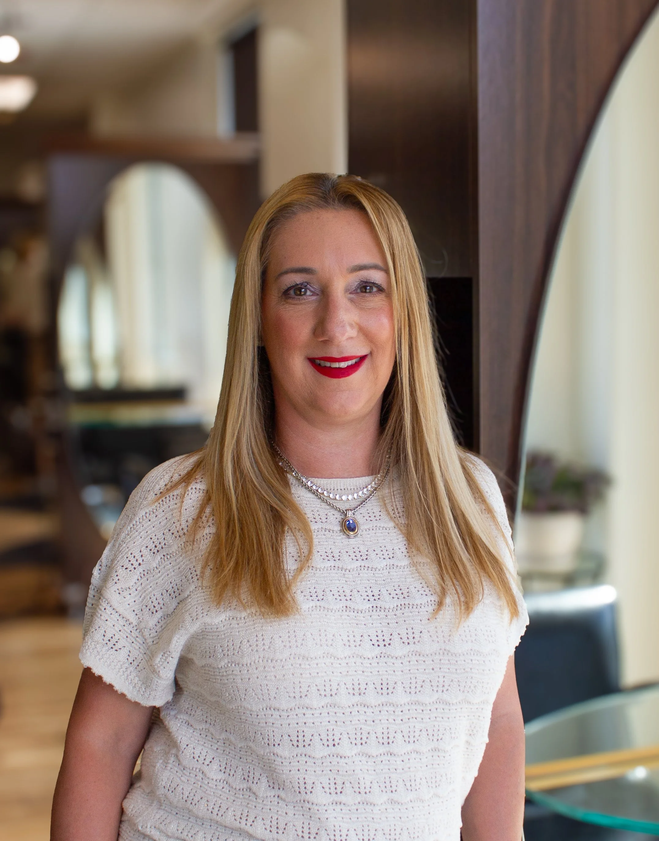 Rosita, hair stylist specialist at Prestige Salon in Wayne, Pennsylvania.