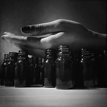 An artist turns her daily dependence on a life-enabling drug into a meditation on survival and global inequality: the same medication that makes her life possible would be out of reach had she been born elsewhere. Geography is fate.PHE 2 exhibition.