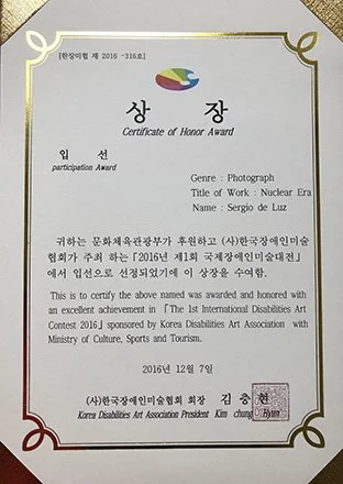 Certificate of Honor Award for a photography work titled 'Nuclear Era' awarded to Sergio de Luz, exhibited in Seoul Korea.