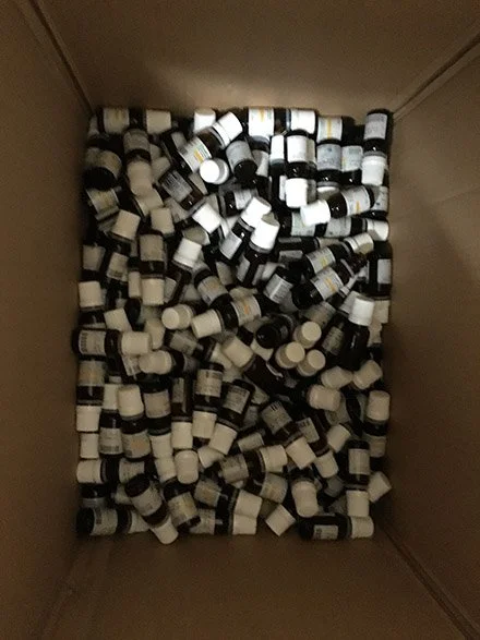 An artist turns her daily dependence on a life-enabling drug into a meditation on survival and global inequality: the same medication that makes her life possible would be out of reach had she been born elsewhere. Geography is fate. PHE. wash