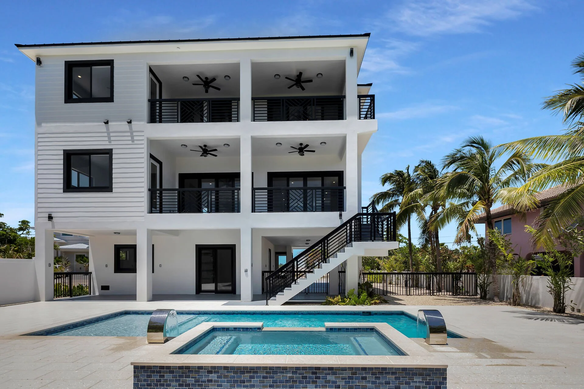 Rear view of luxury pool home in Stirrup Key Marathon Florida