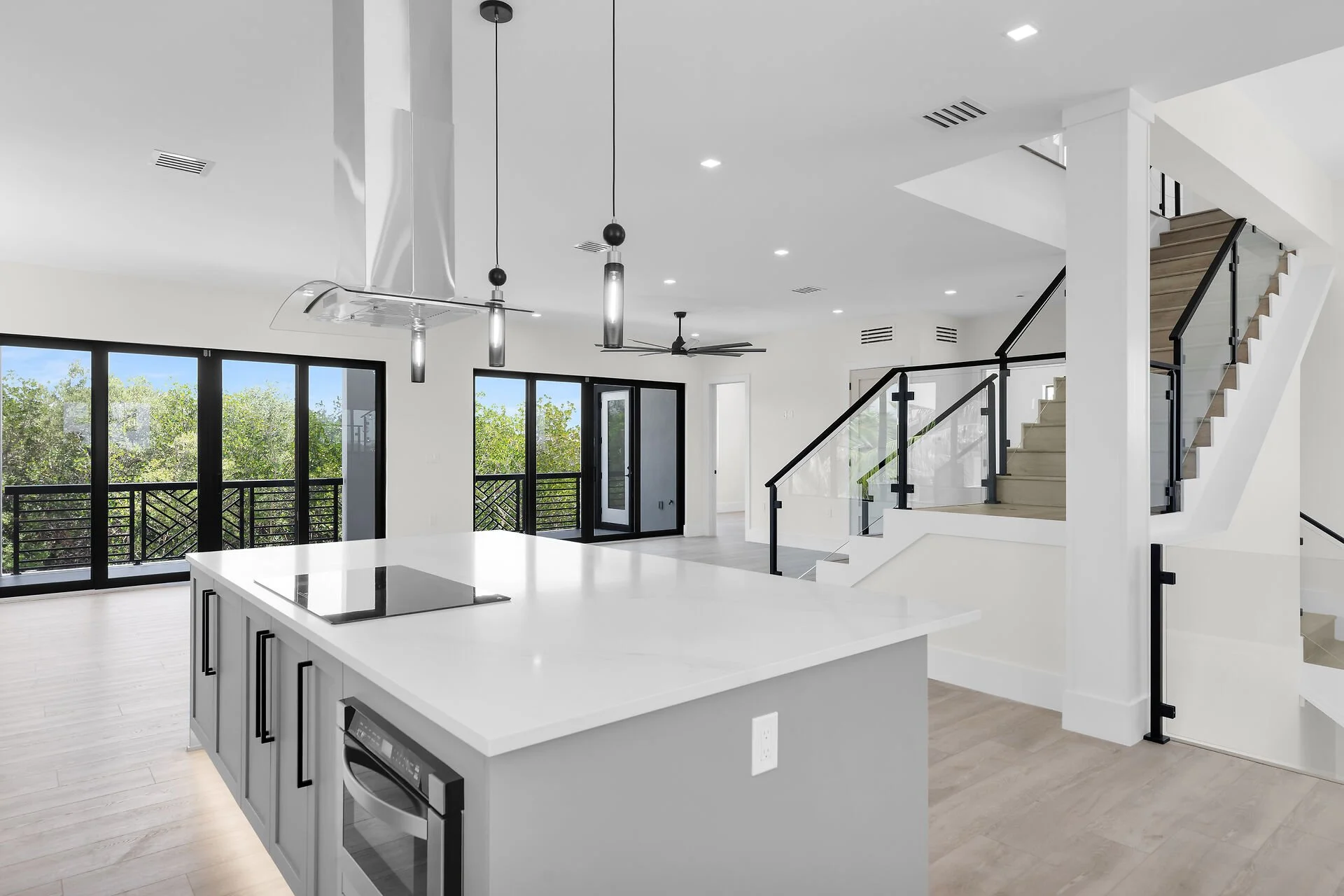Modern luxury kitchen with quartz counters inside Marathon Florida waterfront home