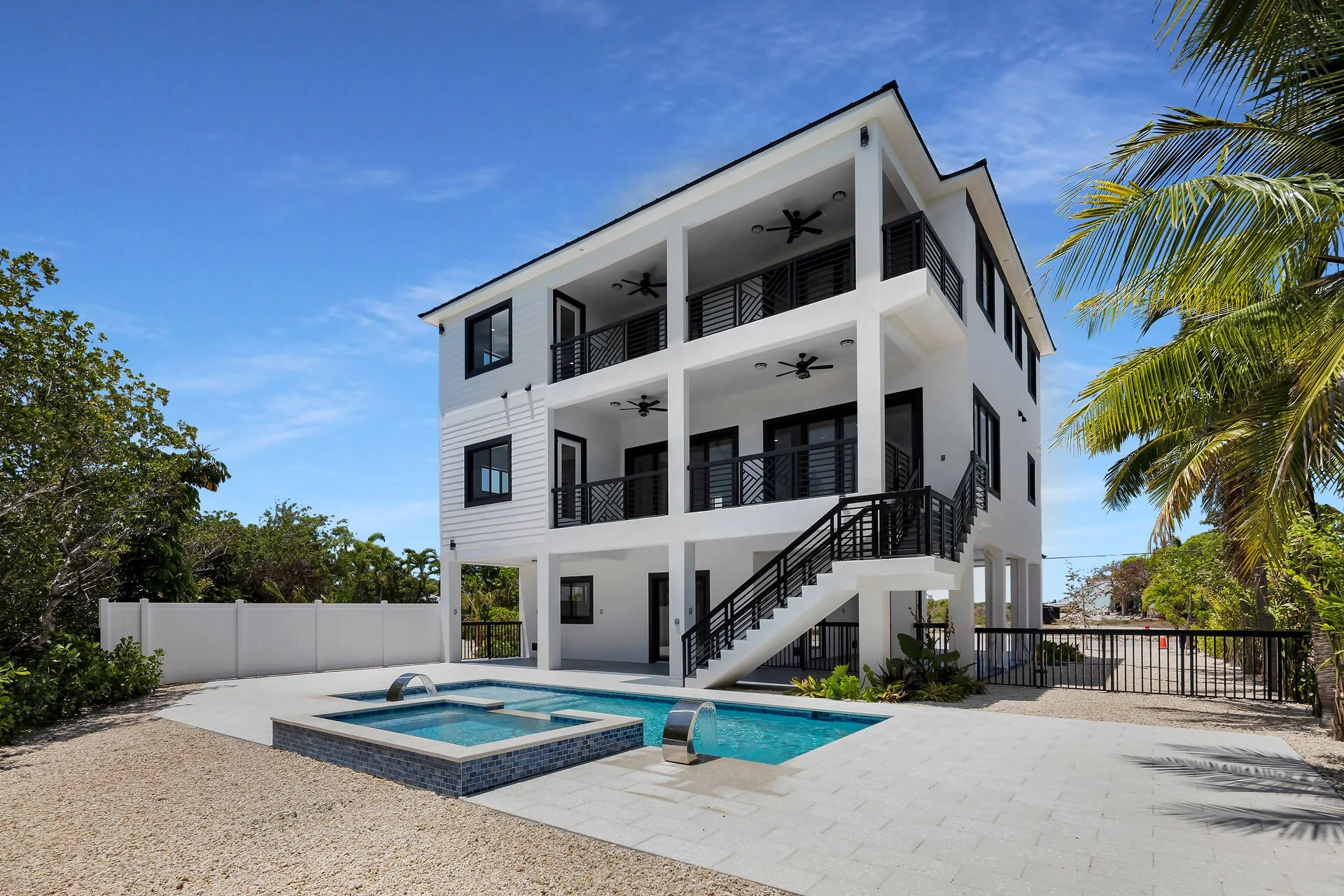 Rear view of luxury pool home in Stirrup Key Marathon Florida