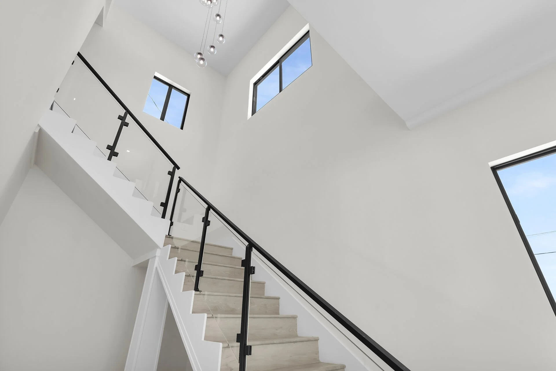 Modern Glass Staircase in Marathon Florida pool home
