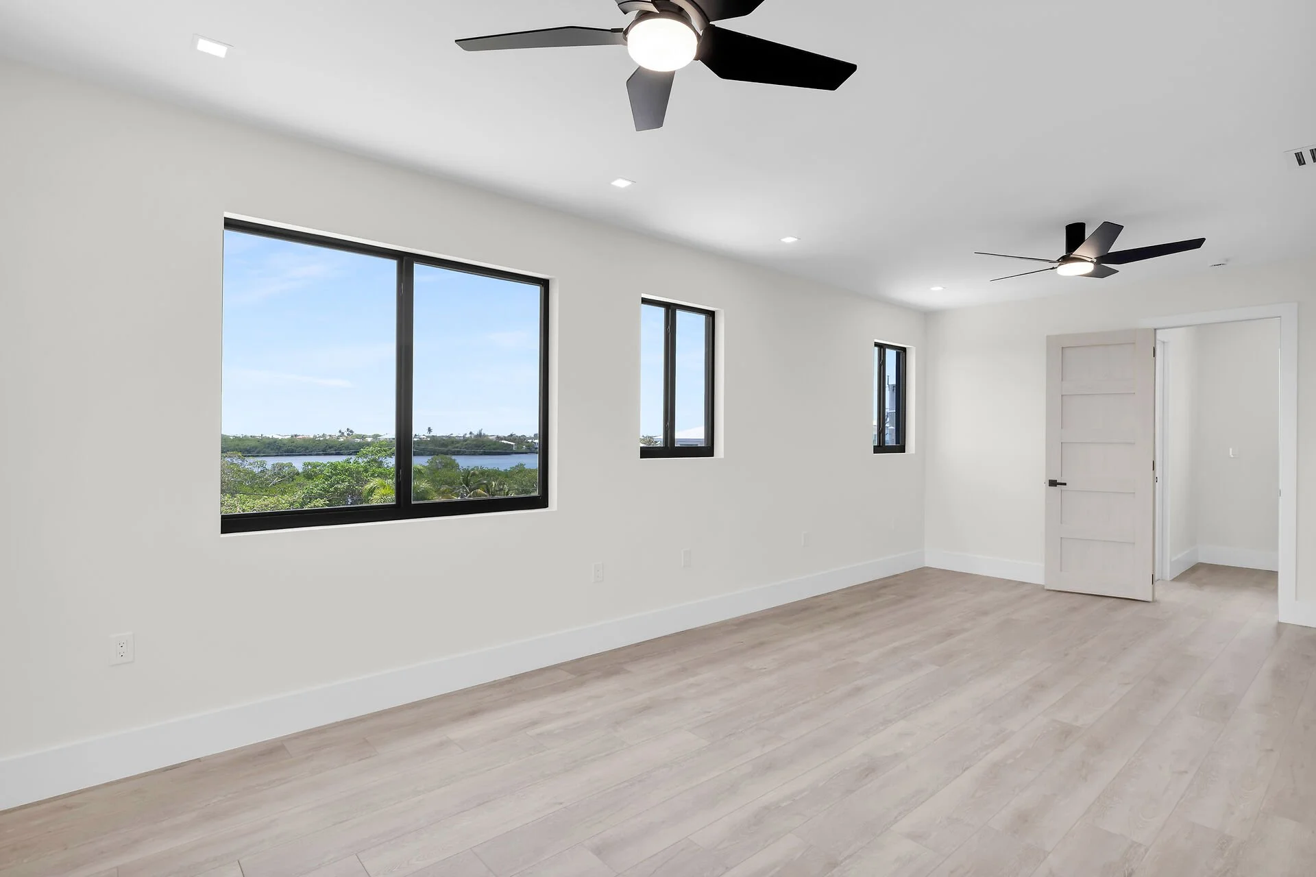Luxury primary suite inside this New  pool home in Marathon Florida