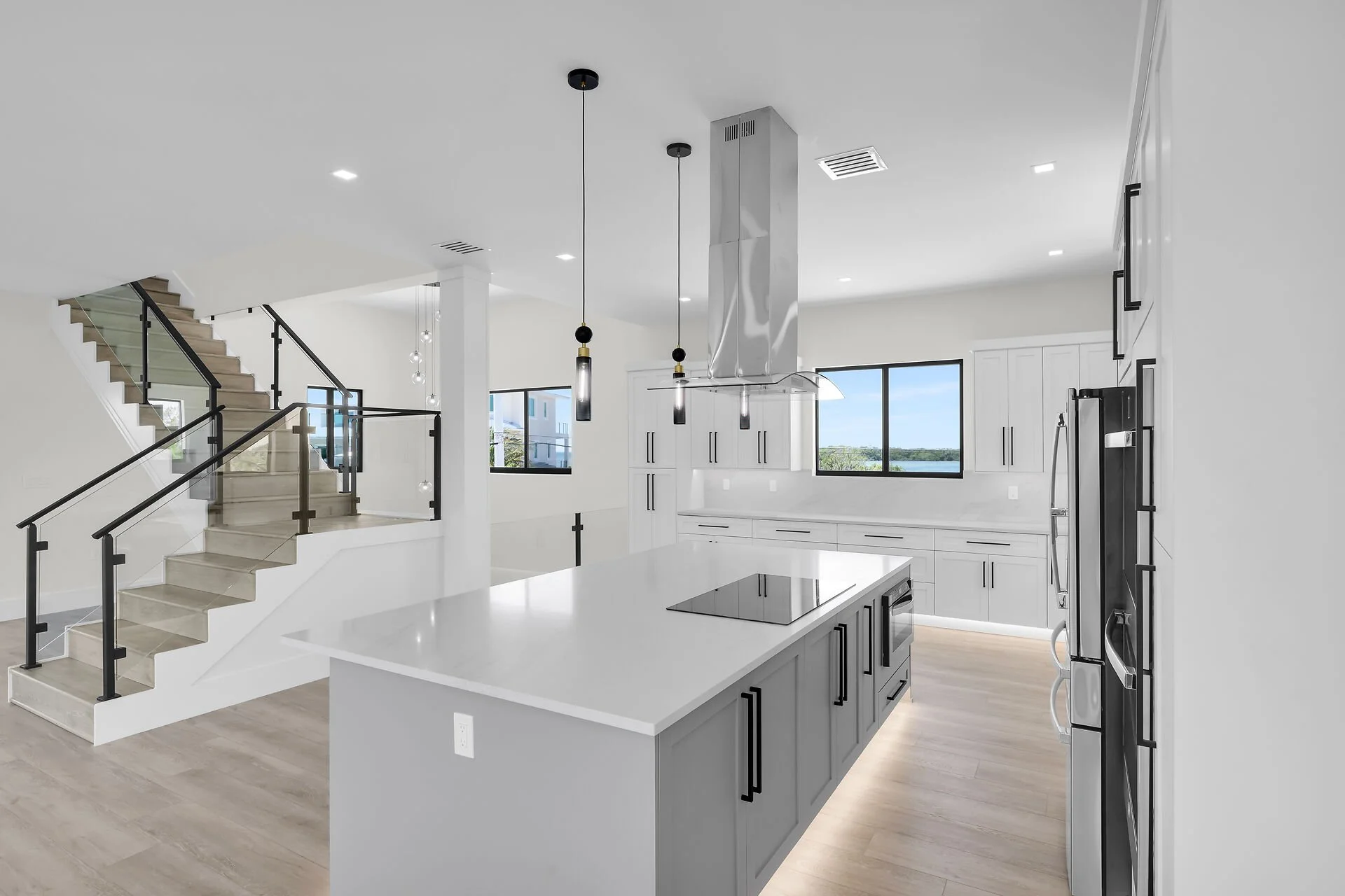 Modern luxury kitchen with quartz counters inside Marathon Florida waterfront home
