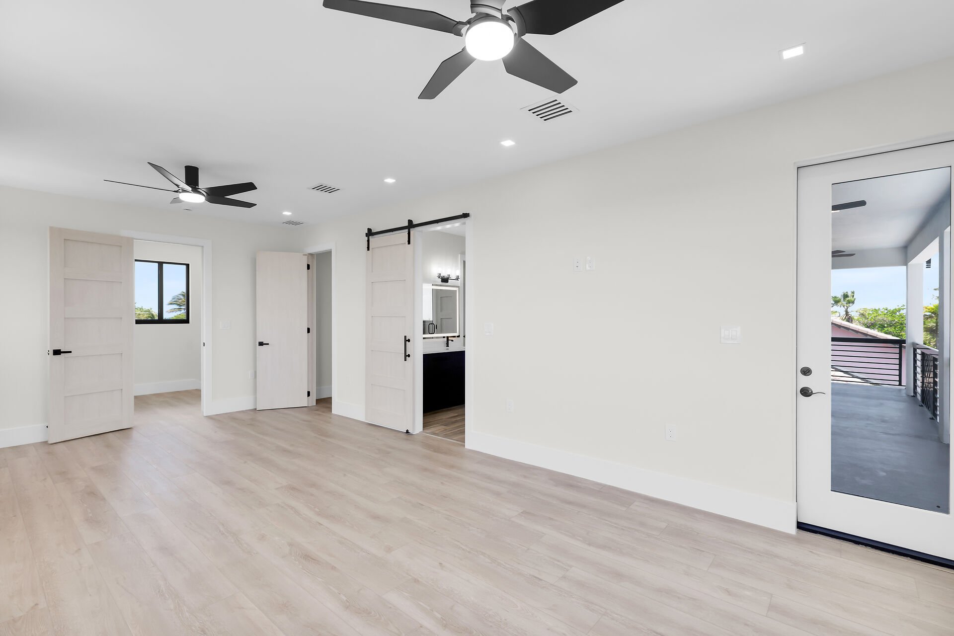 Luxury primary suite inside this New  pool home in Marathon Florida