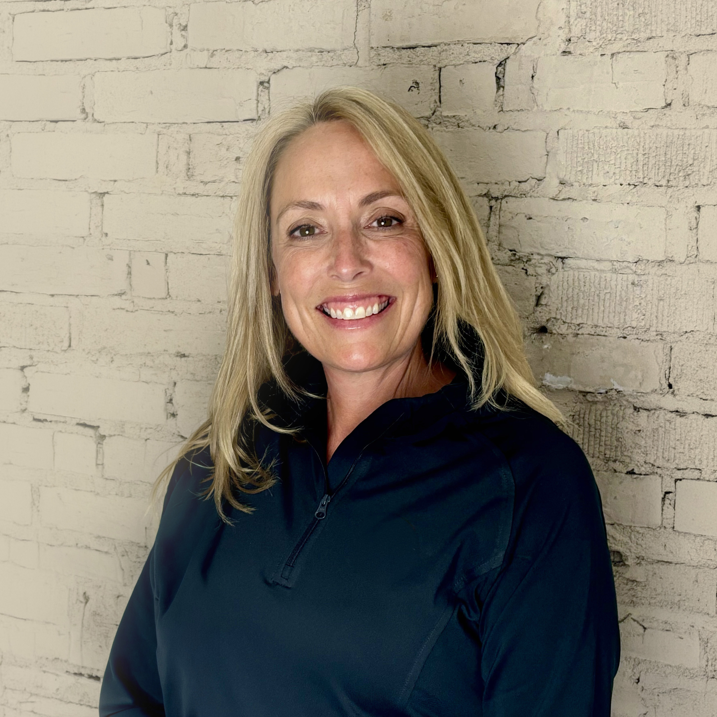 Ann McLaughlin, Doctor of Physical Therapy and founder of The Futureproof Female, providing personalized coaching for women in midlife.