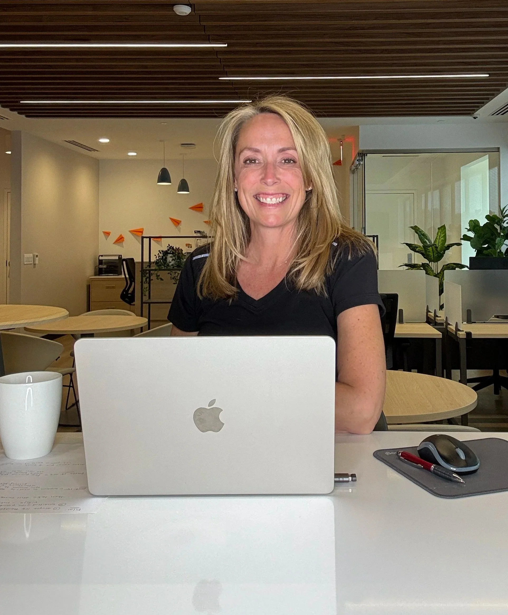 Ann McLaughlin creating personalized exercise and coaching programs for women in midlife through Futureproof Female's individualized 1-on-1 coaching process.
