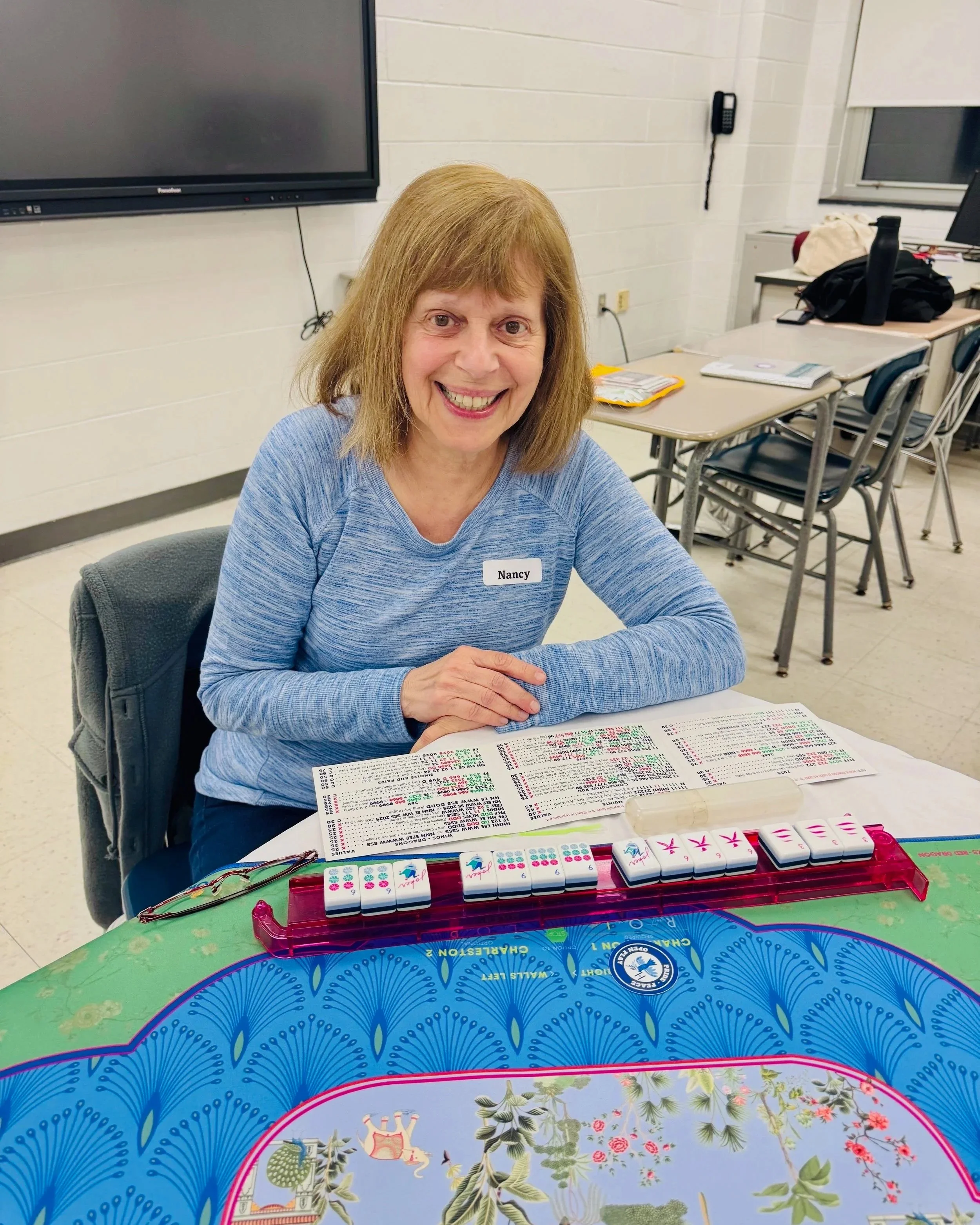 A woman playing mahjong
