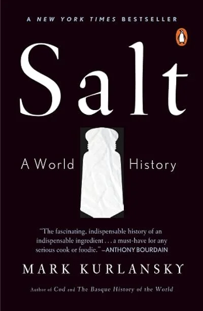 Book cover of 'Salt: A World History' by Mark Kurlansky, featuring a black background, the book title in large white letters, a small penguin logo at the top right corner, and a white silhouette of a salt shaker in the center.