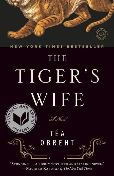Book cover of 'The Tiger's Wife' by Téa Obreht featuring a tiger's paw and leg at the top, with the title and author's name below.