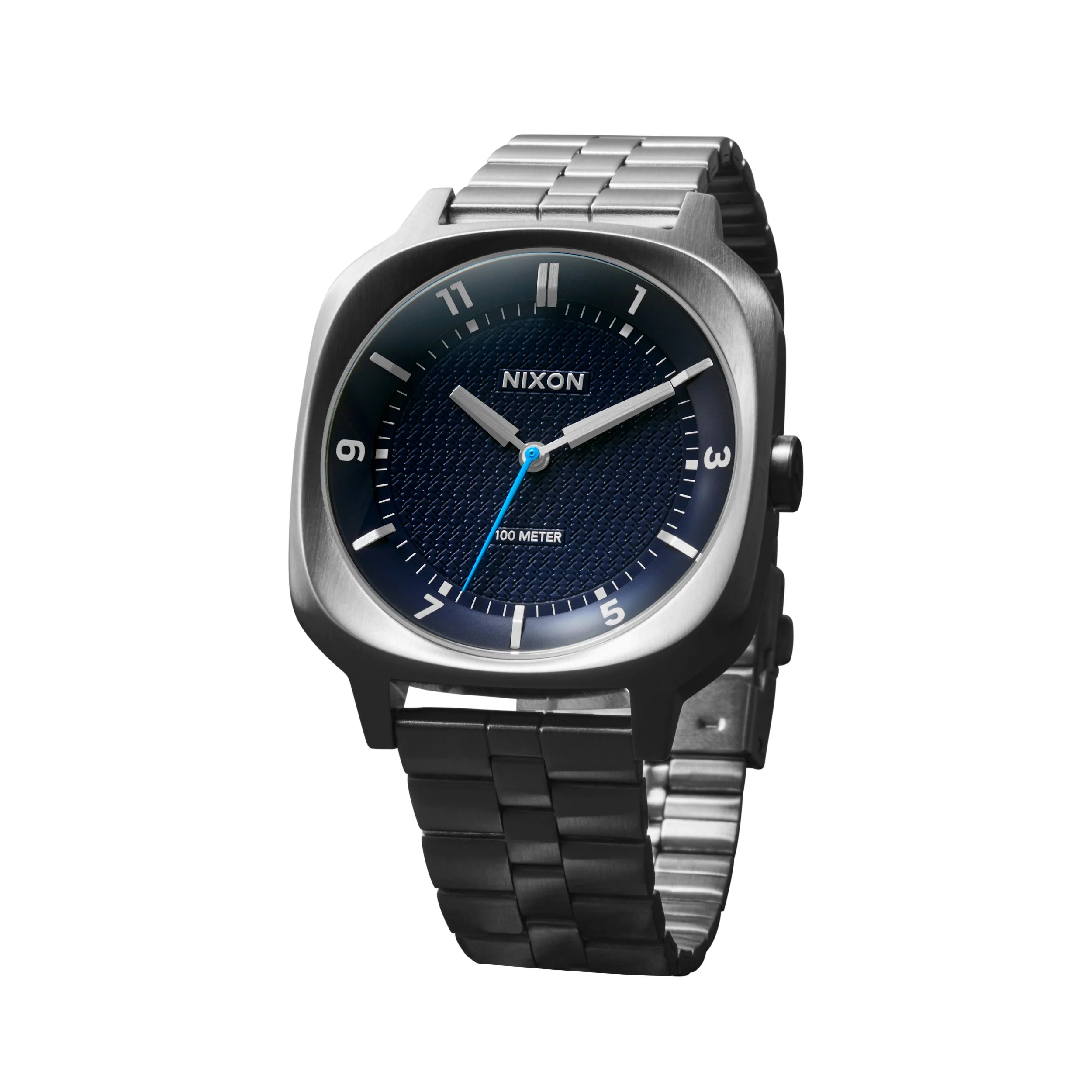 Retouched product shot of a Nixon wristwatch with a metal band and a dark blue textured dial. Shot to be composited into the AI generated background image and replace the AI generated watch.