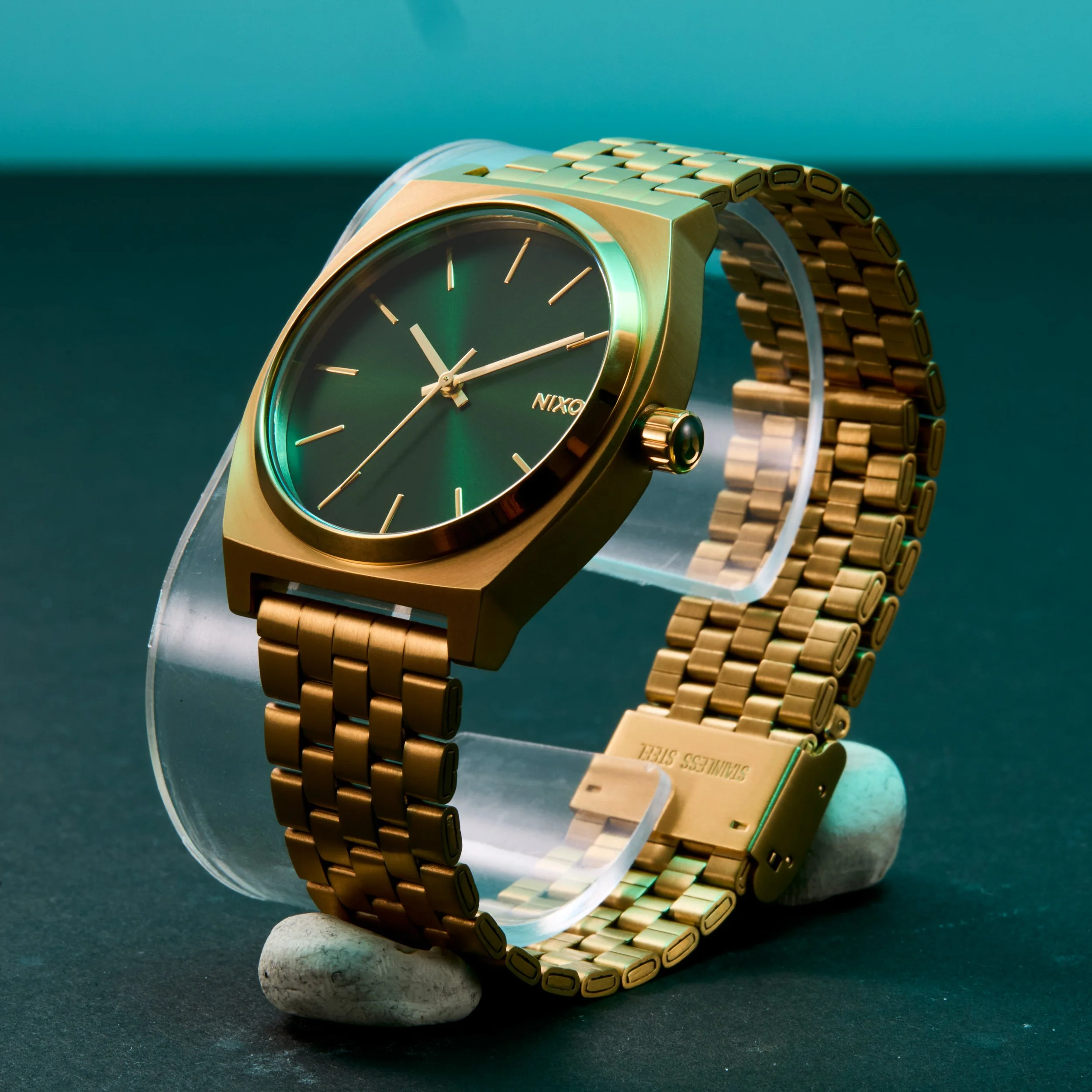 Unretouched product shot of a Nixon wristwatch. Shot to be composited into the AI generated background image and replace the unusable AI generated watch.