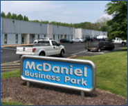Sign for McDaniel Business Park industrial complex. 