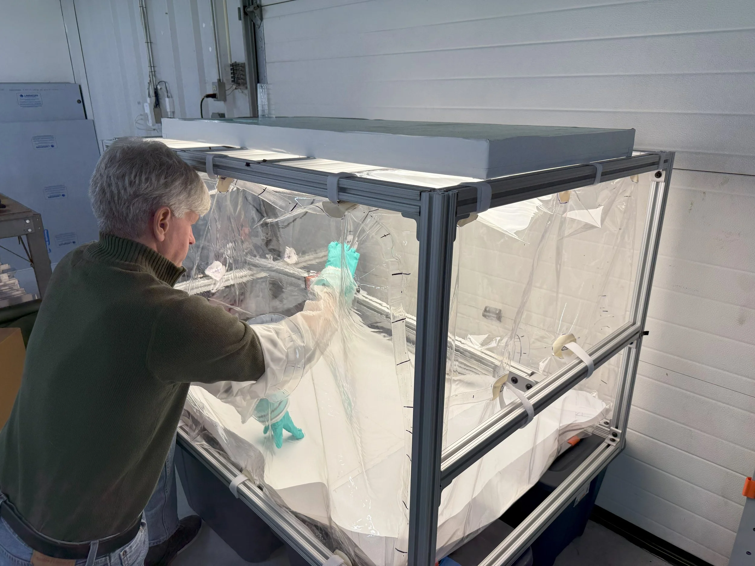 Experiments with a glove bag to test product development using lunar regolith. 
