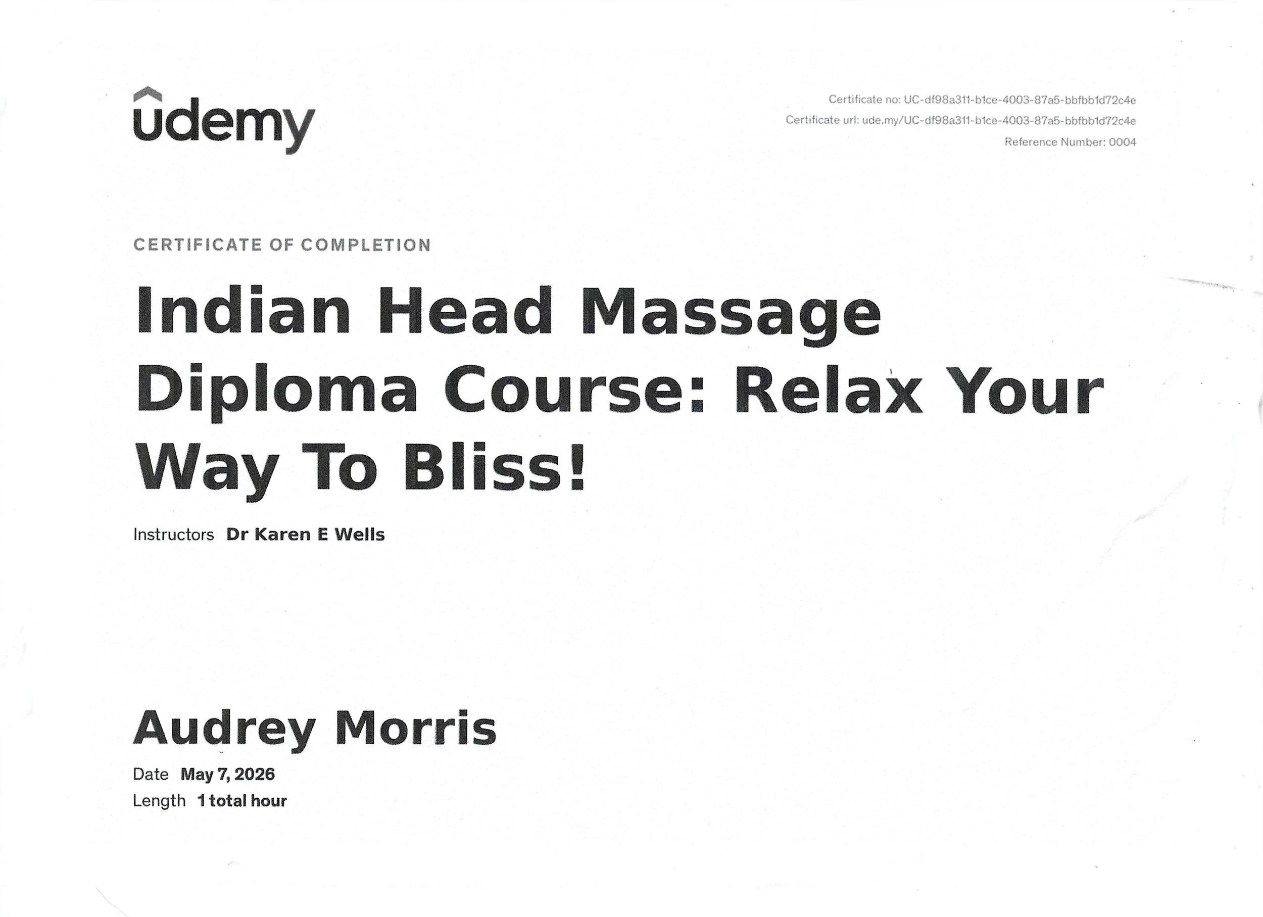 Certificate of completion for an Indian head massage diploma course titled 'Relax Your Way To Bliss' at Udemy, instructed by Dr. Karen E Wells, awarded to Audrey Morris on May 7, 2026, for a total duration of 1 hour.