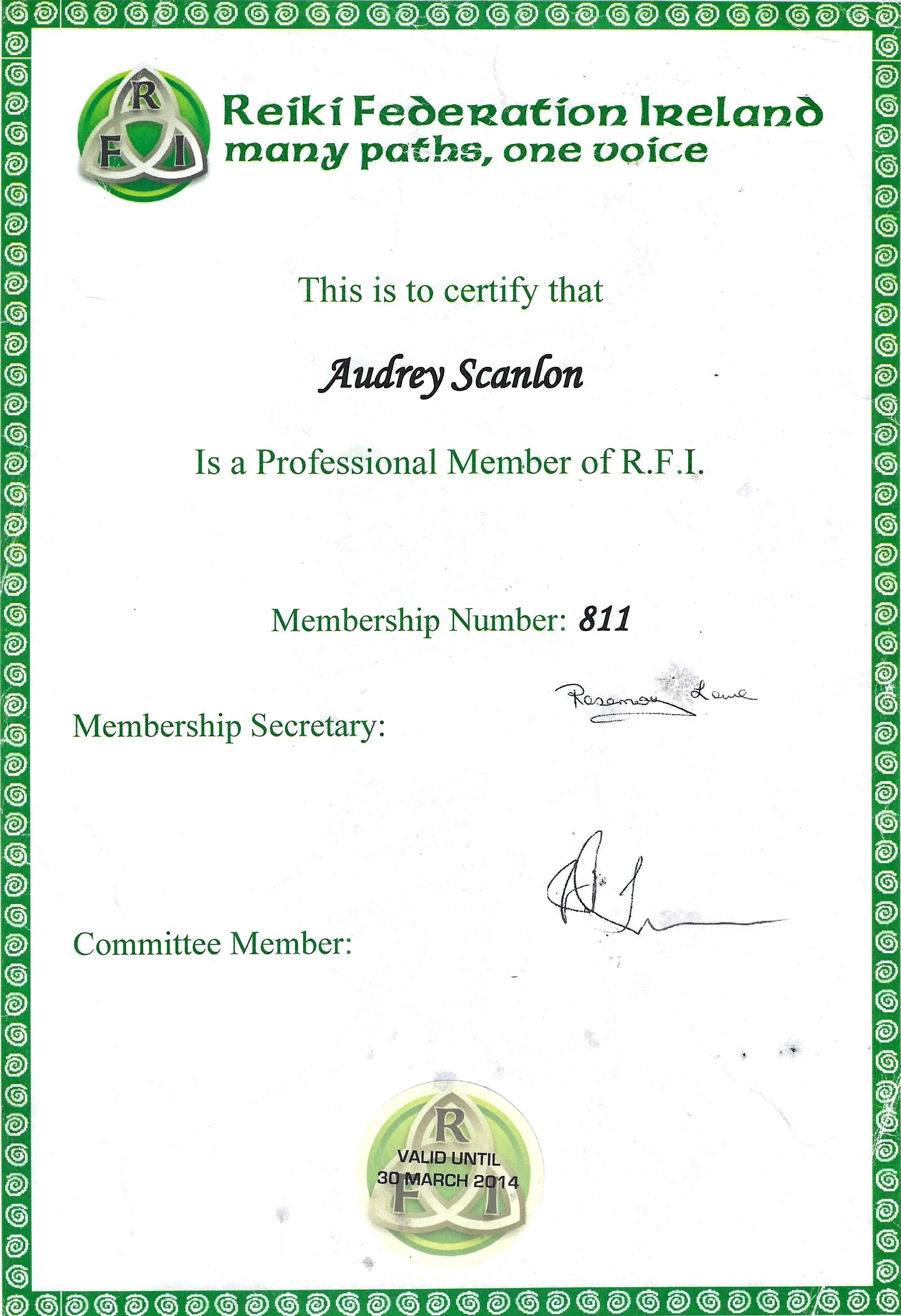 Official certificate from Reiki Federation Ireland certifying Audrey Scanlon as a professional member, with membership number 811, signed by the membership secretary, with a green decorative border and a logo at the top left and bottom center indicating the certification is valid until March 30, 2014.