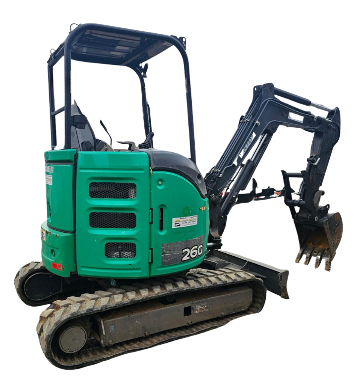 A small green and black mini excavator with tracked wheels.