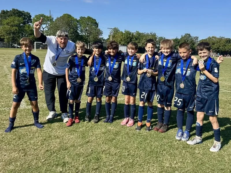 2016 Boys + Coach Joey Champions Cup Winners